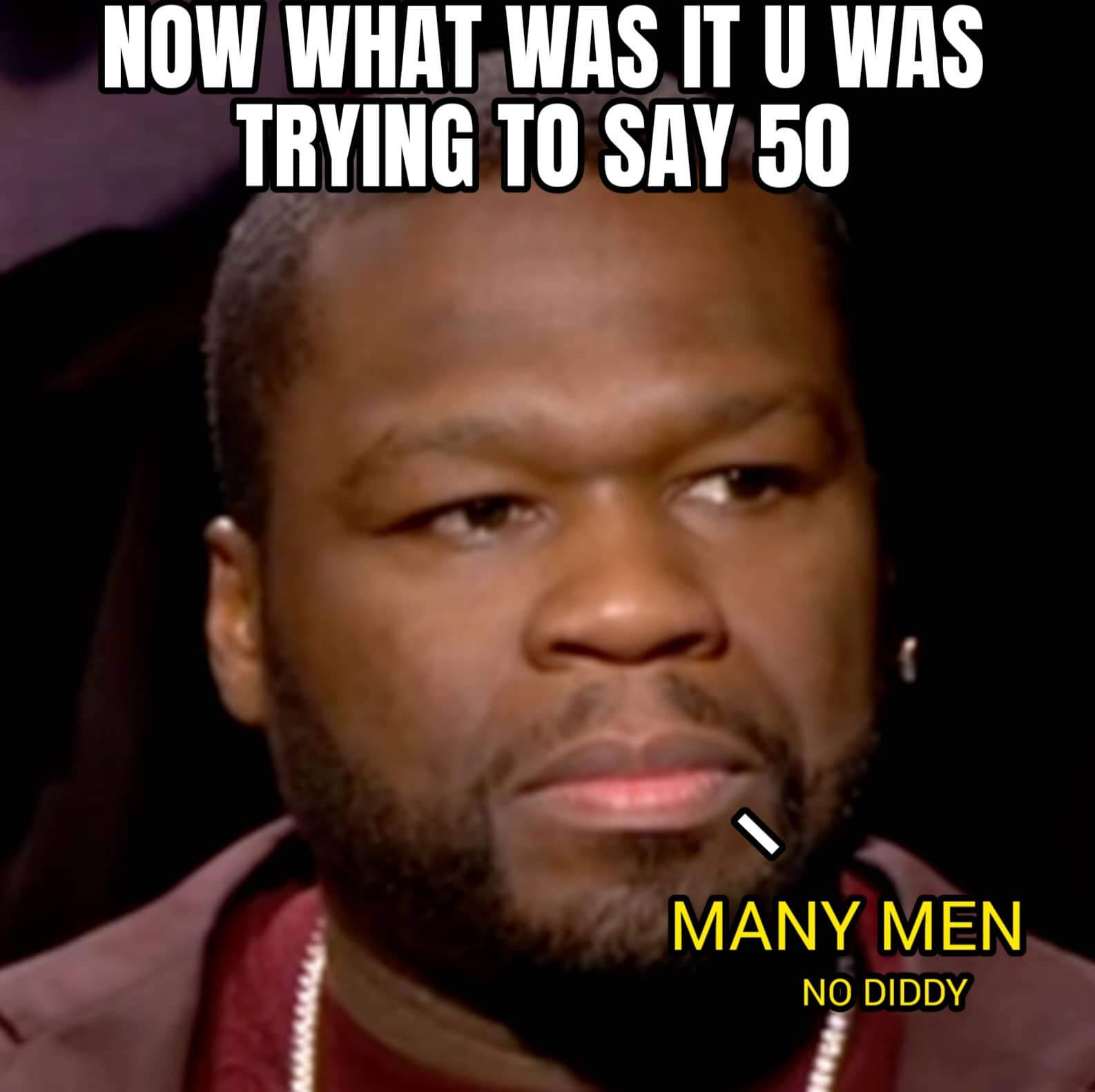 a picture of rapper 50 cent, and it looks like he's at an interview, the shot is up close and the interviewer out of the shot is asking, now what was it you was saying 50? and 50 cent is saying, Many men, no diddy.